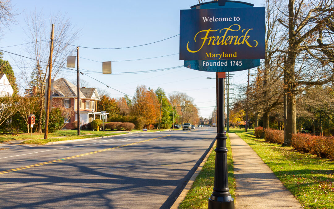 A road sign welcoming people into Frederick MD