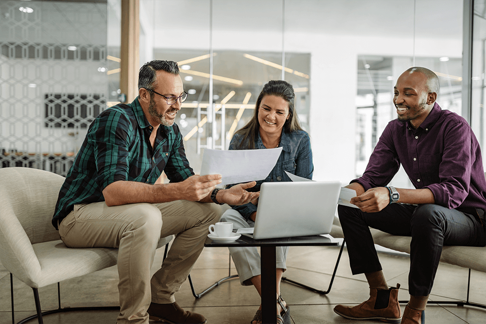 Business team analyzing financial data and marketing growth