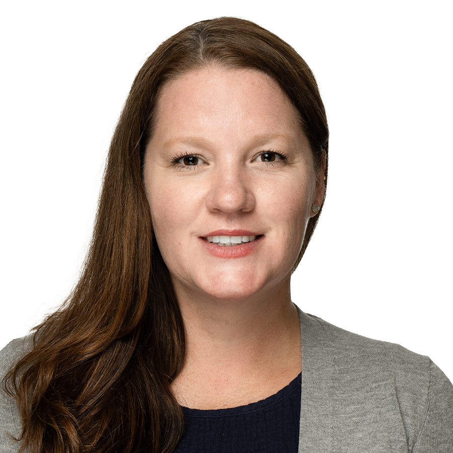 Headshot of Allison Digilio who is a Business Development Coordinator from Pennsylvania. She has reddish-brown hair, glasses and is wearing a green button up.